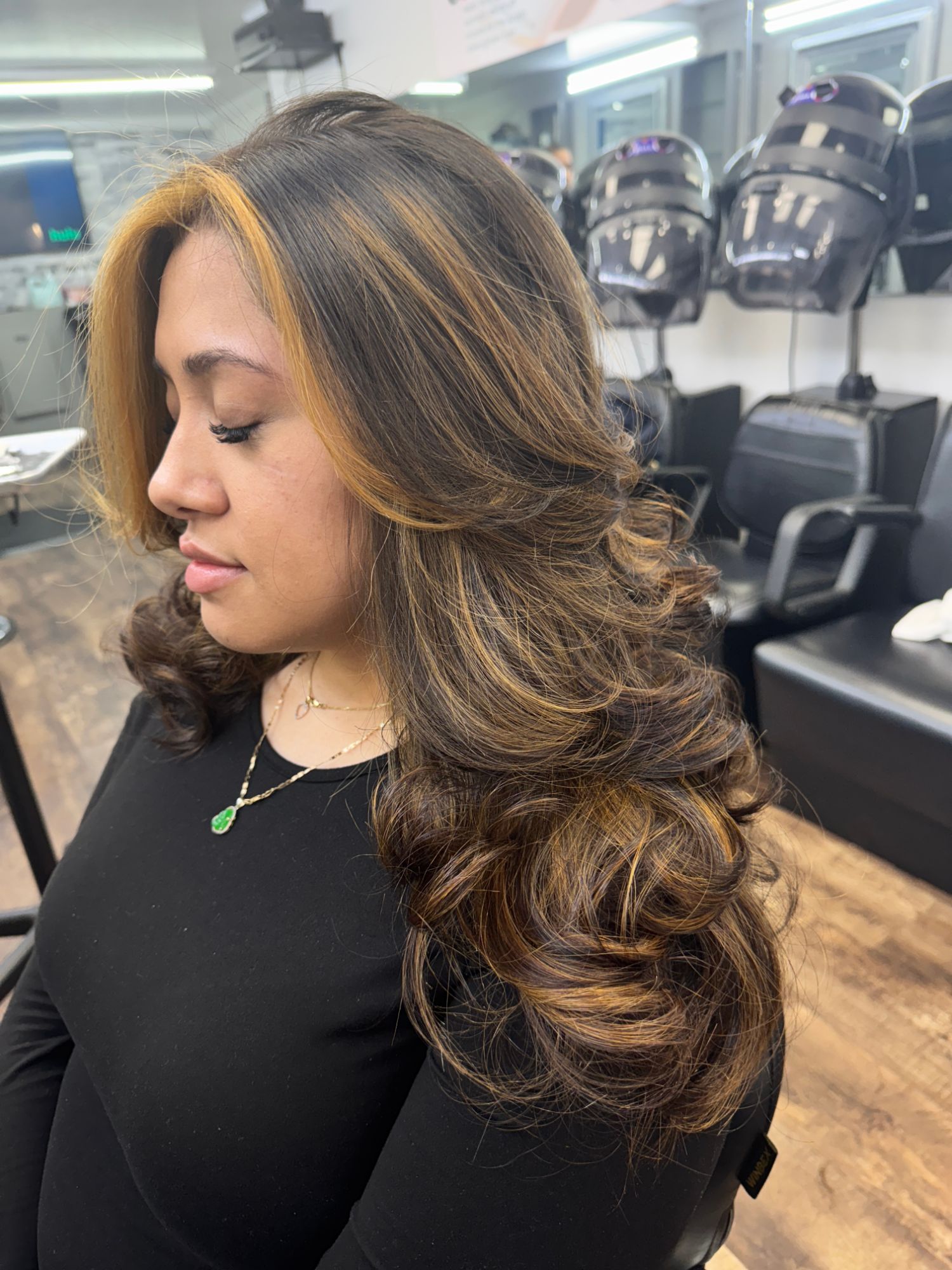 Balayage blowout with golden face frame
