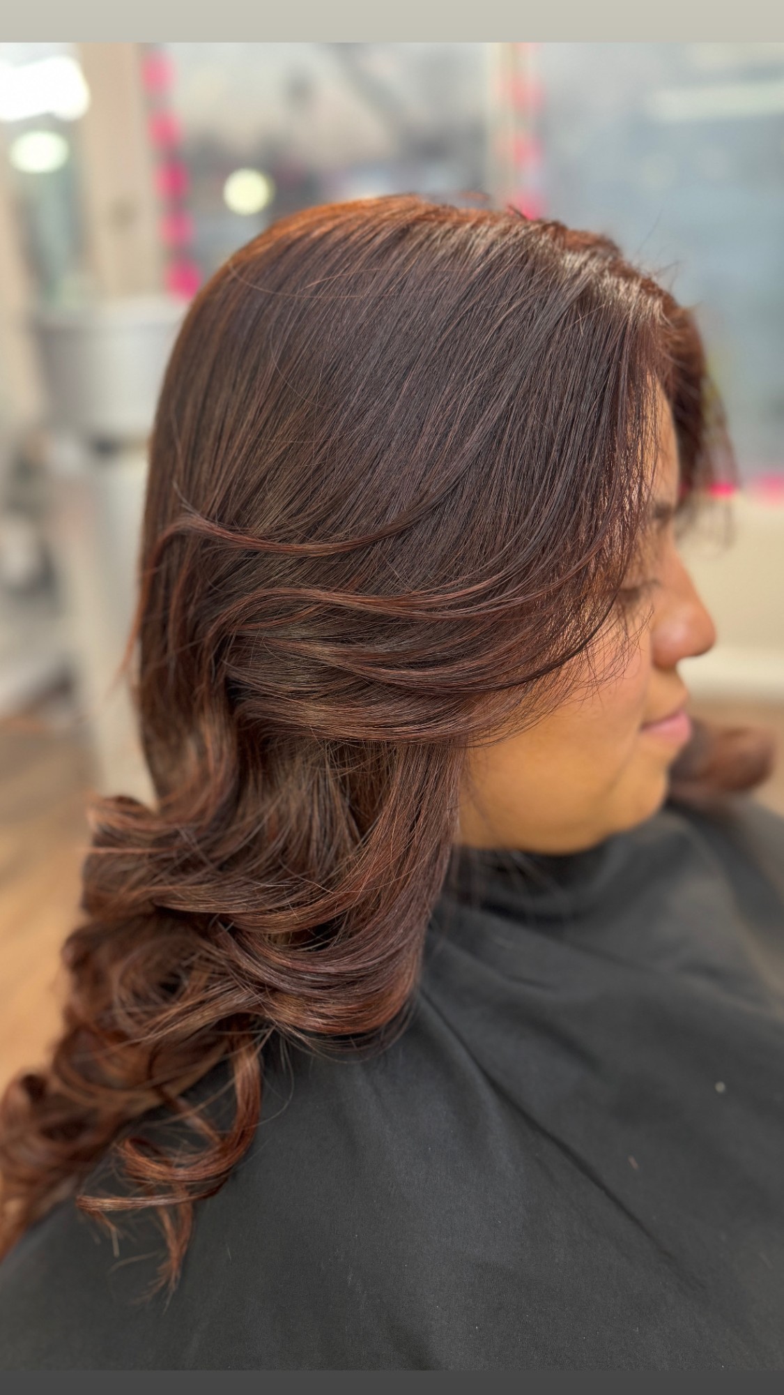 Mahogany color detail with layered waves