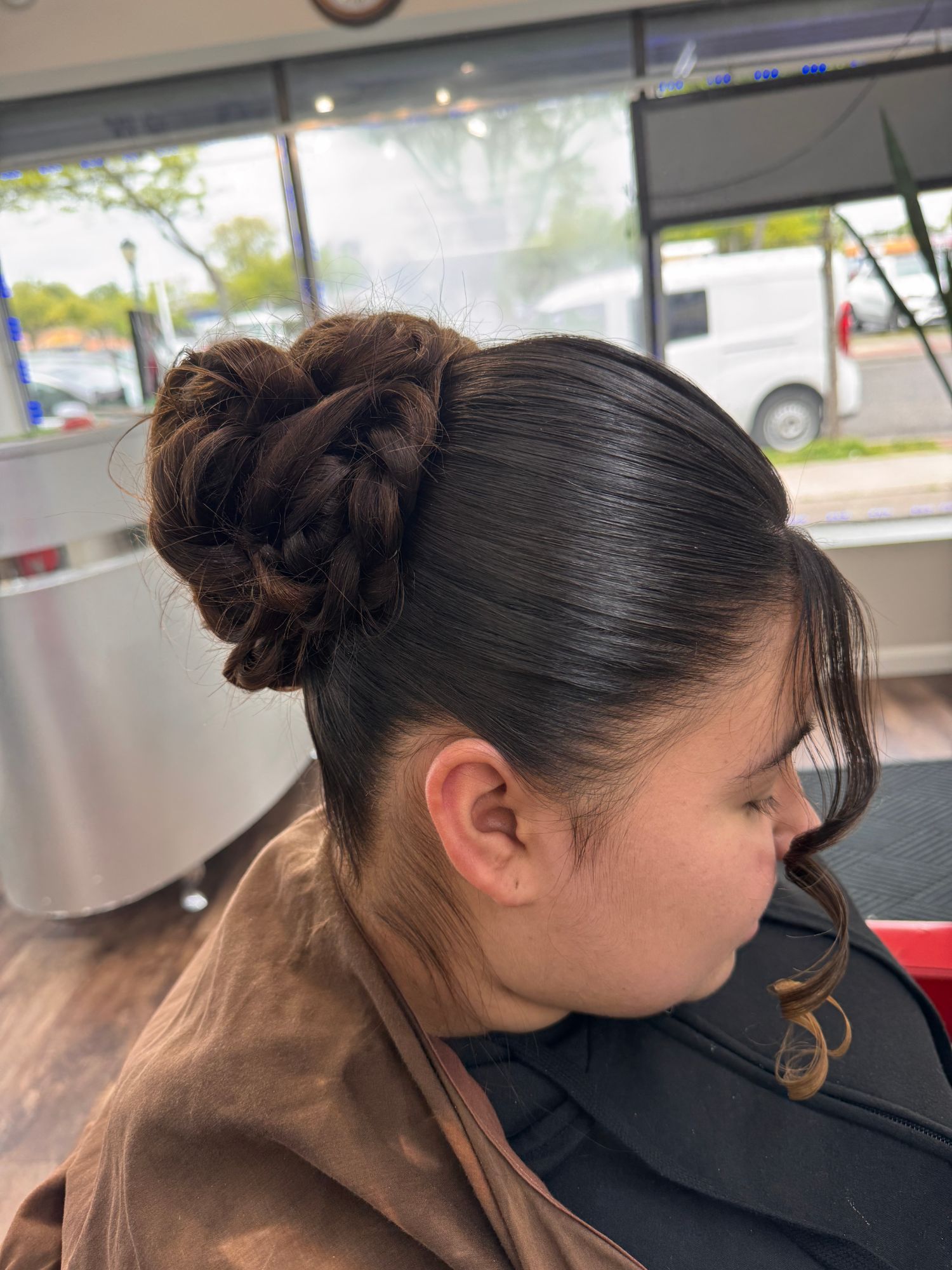 Braided high bun event updo